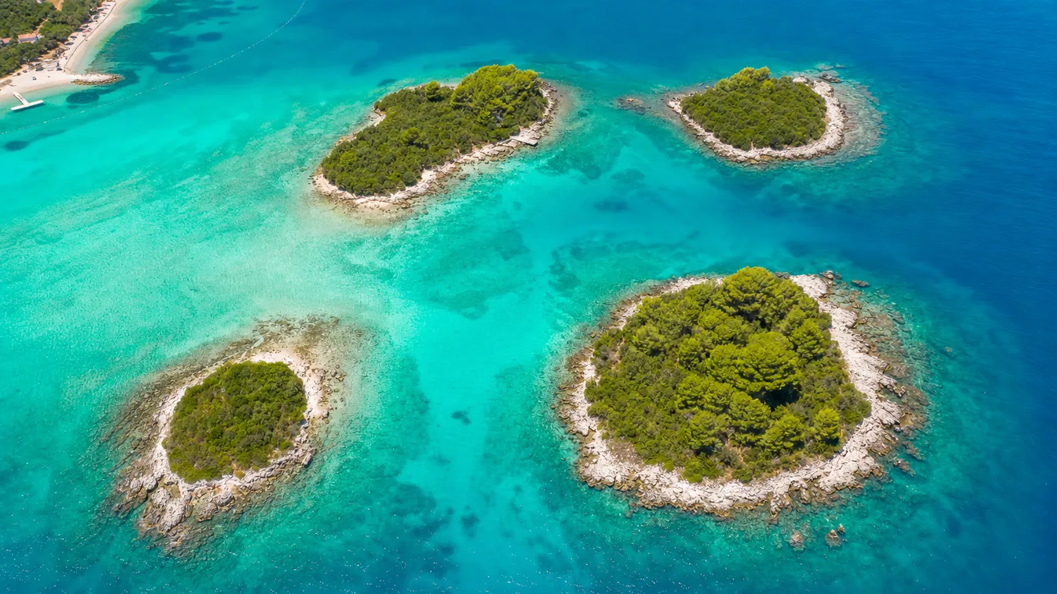 Ksamil islands turquoise water and sandy coves